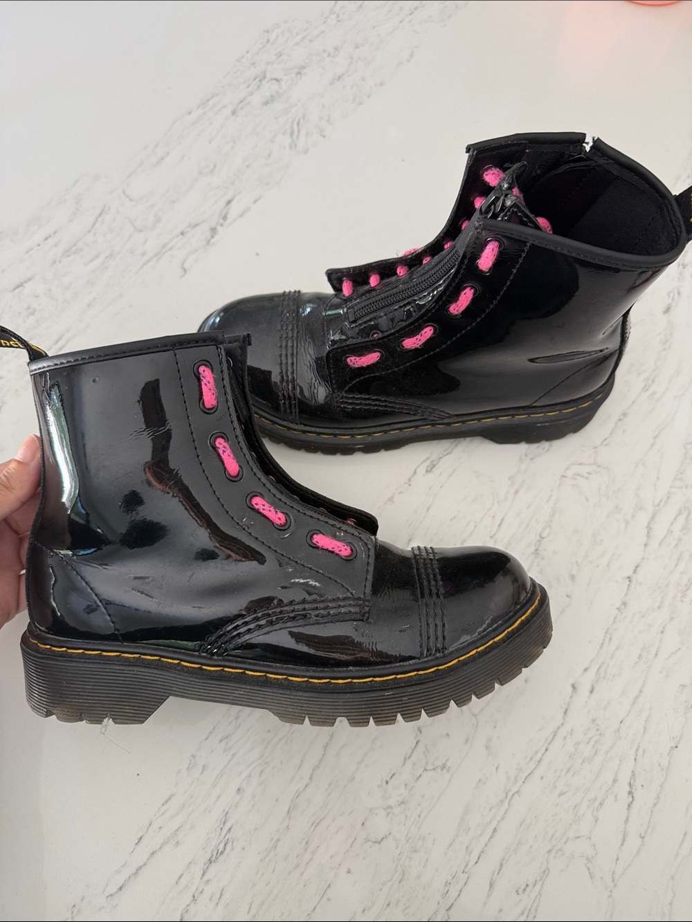 Dr Martens Black Patent Combat Boots with Pink Eyelets